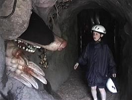 Alasdair is surprised by a very large mole approaching him from the side of a tunnel at the Centre for Alternative Technology, Machynlleth